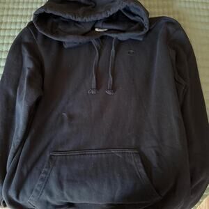 Black champion hoodie worn a